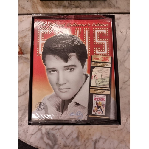 1352 - A collection of reproduction Elvis Presley ephemera and memorabilia, boxed.... 