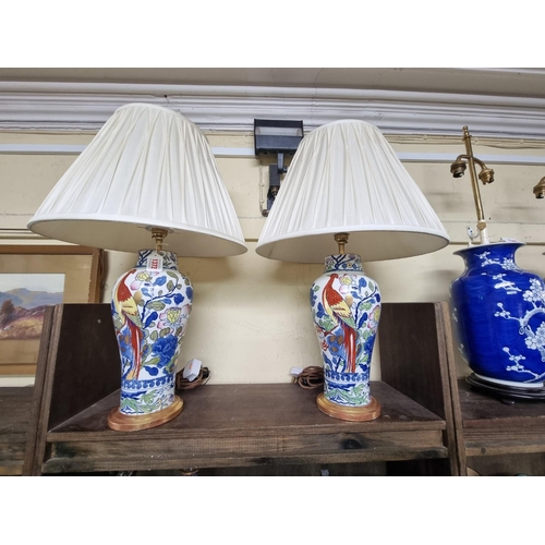 1372 - A pair of Mason's Ironstone vase form table lamps, total height 61cm.