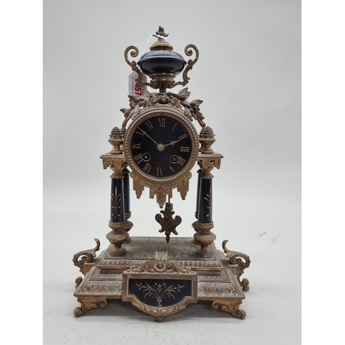 1457 - A Louis XVI style gilt metal mantel clock, 39cm high.