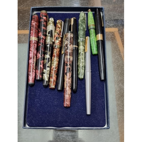 1497 - Eleven vintage pens, each with 14ct nib. 