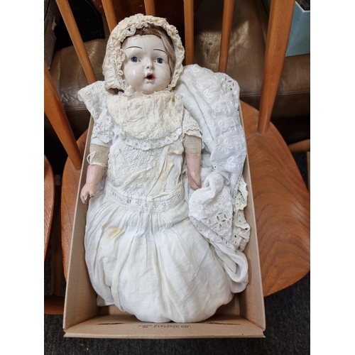 1505 - An antique Continental doll, with composition head, wearing lace bonnet and dress.