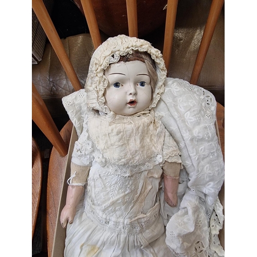 1505 - An antique Continental doll, with composition head, wearing lace bonnet and dress.