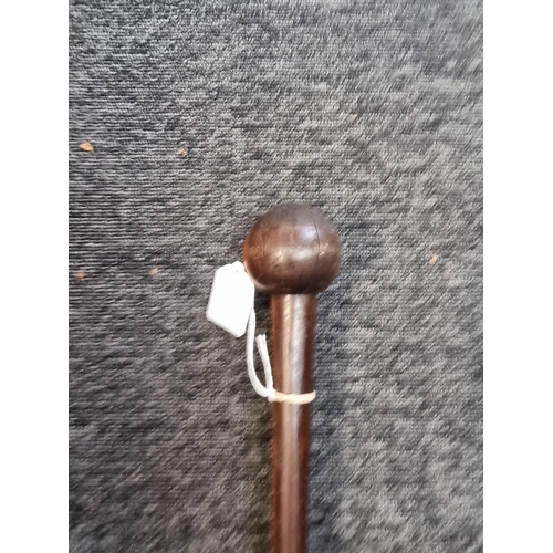 1541 - A knobkerrie style hardwood cane, 90cm long. 