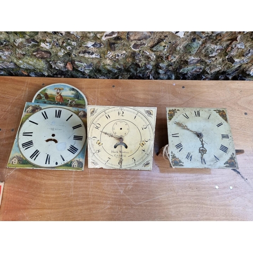 1549 - Two 19th century 30 hour longcase clock dials and movements, 12in and 11in; together with another 30... 