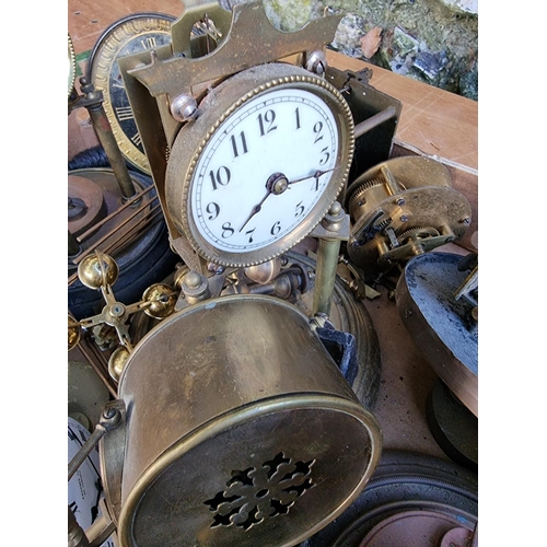 1550 - A selection of clock parts, to include anniversary clocks; and a rosewood five dial banjo barometer,... 