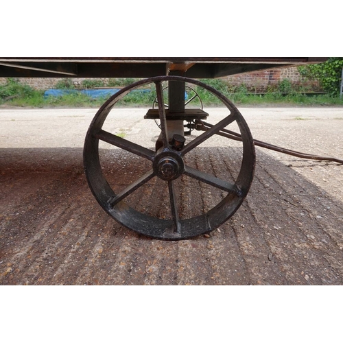 1548A - An early 20th century aluminium circus wagon, on four wheel base, 300cm long x 137.5cm wide x 2... 