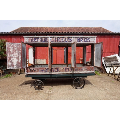 1548A - An early 20th century aluminium circus wagon, on four wheel base, 300cm long x 137.5cm wide x 2... 