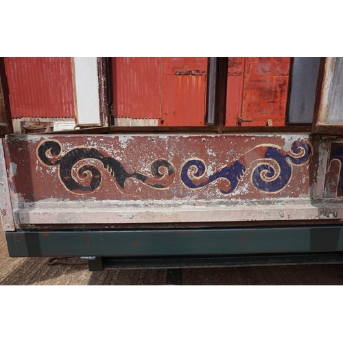 1548A - An early 20th century aluminium circus wagon, on four wheel base, 300cm long x 137.5cm wide x 2... 