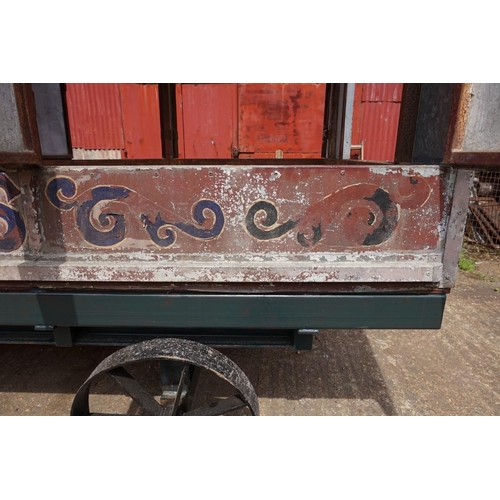 1548A - An early 20th century aluminium circus wagon, on four wheel base, 300cm long x 137.5cm wide x 2... 