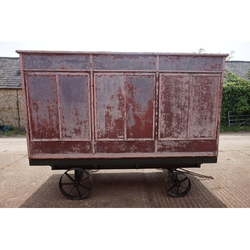 1548A - An early 20th century aluminium circus wagon, on four wheel base, 300cm long x 137.5cm wide x 2... 