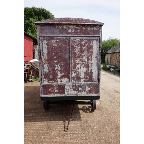 1548A - An early 20th century aluminium circus wagon, on four wheel base, 300cm long x 137.5cm wide x 2... 