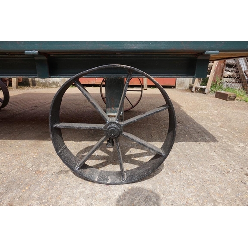 1548A - An early 20th century aluminium circus wagon, on four wheel base, 300cm long x 137.5cm wide x 2... 