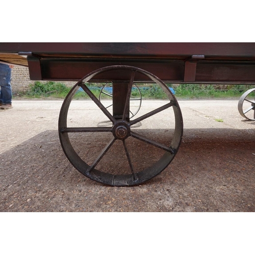 1548A - An early 20th century aluminium circus wagon, on four wheel base, 300cm long x 137.5cm wide x 2... 