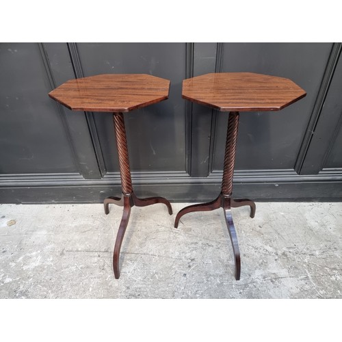 1050A - A pair of Regency style mahogany hexagonal tripod tables, 37.5cm wide. (2)