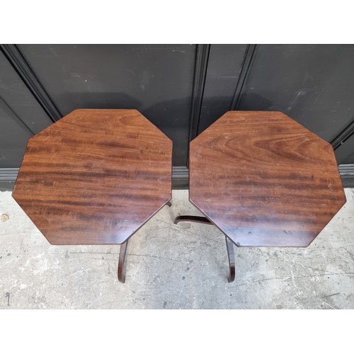 1050A - A pair of Regency style mahogany hexagonal tripod tables, 37.5cm wide. (2)