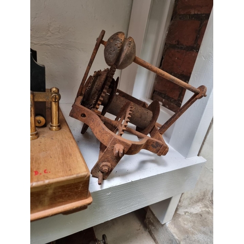 1183 - An old induction coil, 39cm wide; together with an old spit jack mechanism.