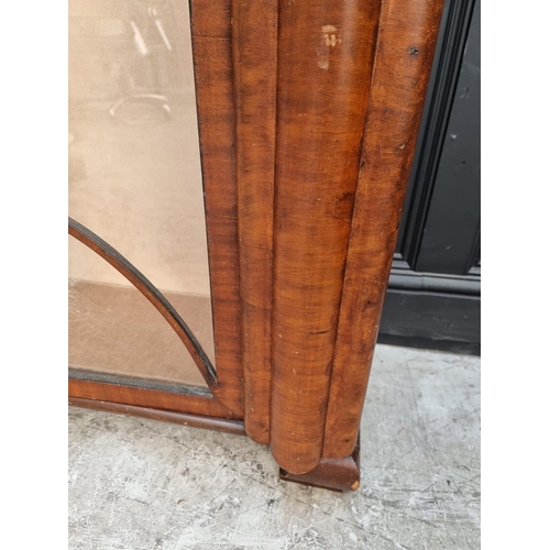 1013 - An 1930s mahogany display cabinet, 119.5cm wide.