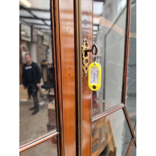 1017 - An antique mahogany standing corner display cabinet, labelled 'Muirhead Moffat & Co Antiques, Gl... 