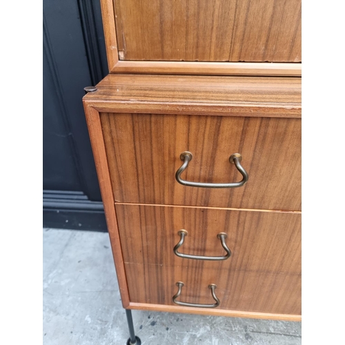 1018 - A 1950s walnut cabinet, by Vanson, 139cm wide, by repute originally purchased from Heals.... 