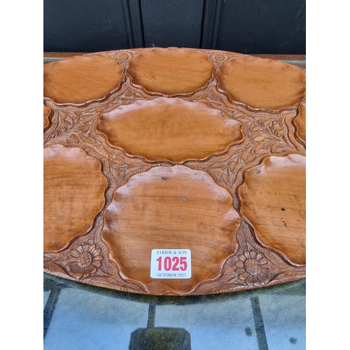 1025 - A Burmese carved walnut tray, 57cm wide. 