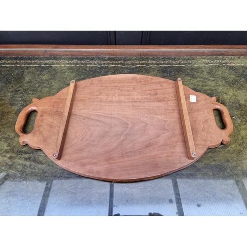 1025 - A Burmese carved walnut tray, 57cm wide. 