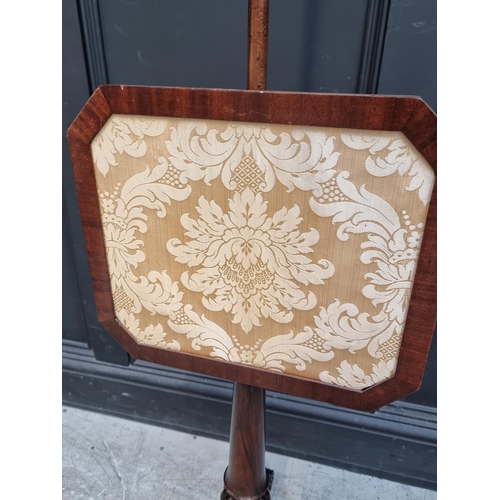 1029 - A Victorian mahogany tripod polescreen.  