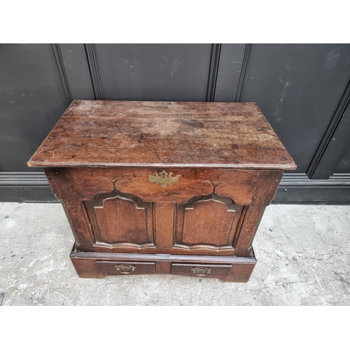 1033 - A 18th century Welsh oak coffor bach, 74cm wide. 