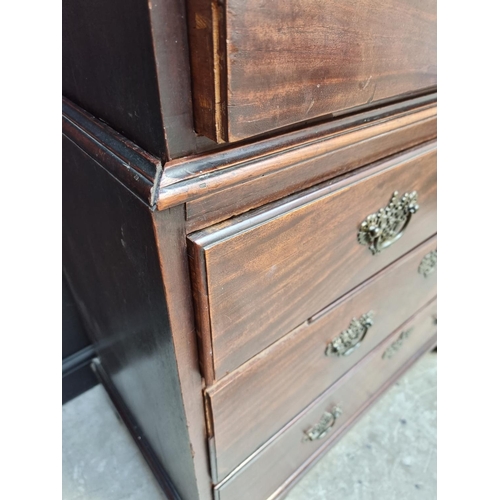 1061 - A George III mahogany chest on chest, 107cm wide.