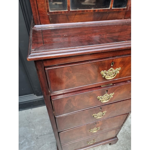 1067 - An antique mahogany narrow bookcase, 52.5cm wide.