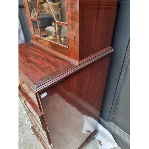 1067 - An antique mahogany narrow bookcase, 52.5cm wide.