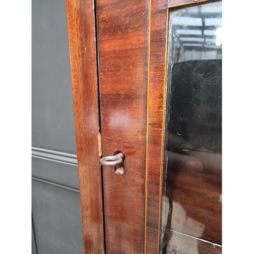 1067 - An antique mahogany narrow bookcase, 52.5cm wide.