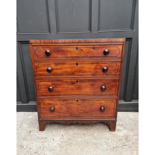 1068 - An early 19th century mahogany and ebony strung chest of drawers, 102cm wide.