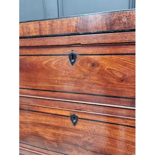 1068 - An early 19th century mahogany and ebony strung chest of drawers, 102cm wide.