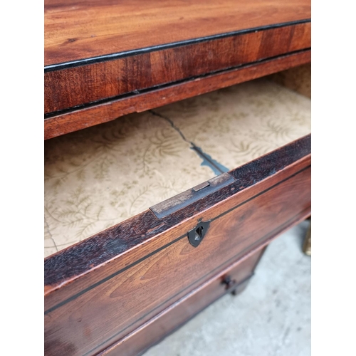 1068 - An early 19th century mahogany and ebony strung chest of drawers, 102cm wide.