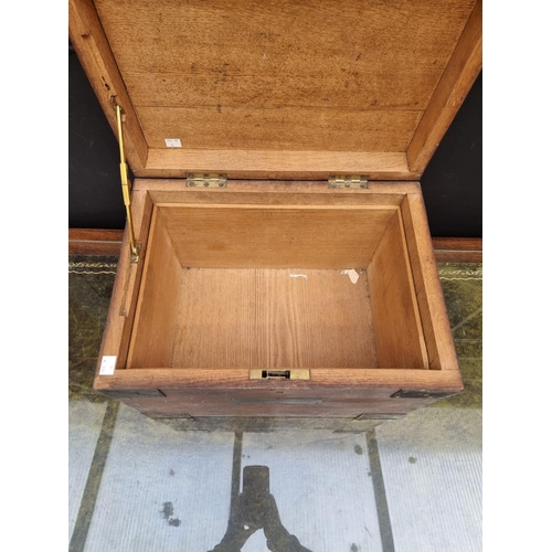 1041 - A Victorian oak and metal bound silver type chest, 46cm wide.