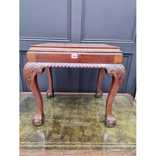 1063 - A George III style carved mahogany stool/table, 55cm wide.