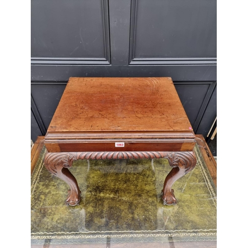 1063 - A George III style carved mahogany stool/table, 55cm wide.