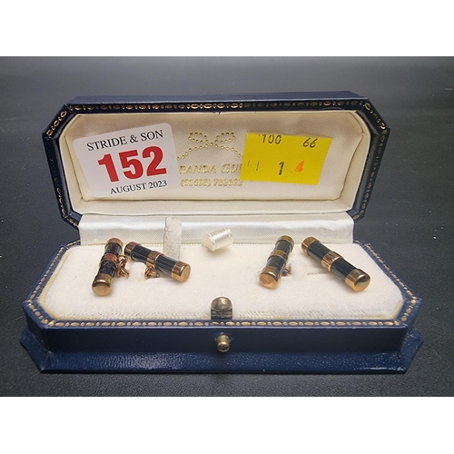 464 - A cased pair of 9ct gold and onyx cylinder cufflinks, by W H M, Birmingham 1999, 21mm long.... 