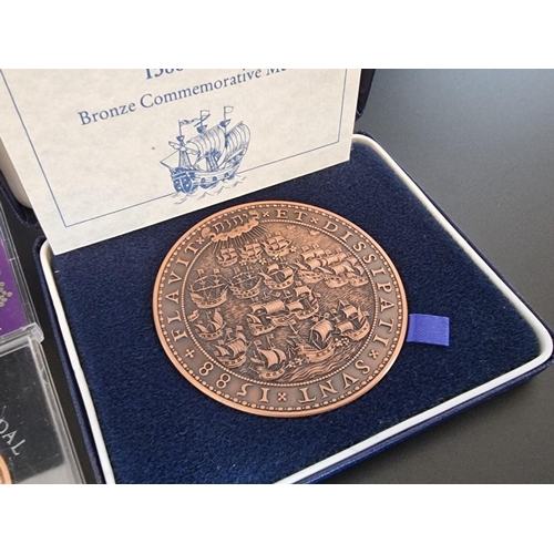 101 - Medals: a 1988 Royal Mint 'Spanish Armada 400th Anniversary 1588-1988' bronze medal, with CoA, boxed... 