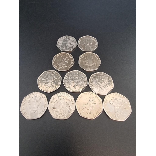 110 - Coins: eleven collectable circulated 50p coins.