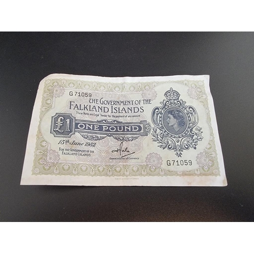 112 - Banknotes: a Queen Elizabeth II Falkland Islands £1, dated 15th June 1982, Serial No.G71059.... 