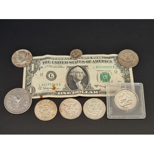 134 - Coins: an 1887 US Morgan silver dollar, (EF); together with six Kennedy half collars; a dime; and a ... 