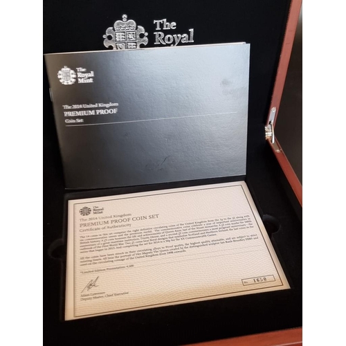 15 - Coins: a 2014 Royal Mint 'UK Premium Proof Set', containing fourteen coins, with CoA No.1650/4500, b... 
