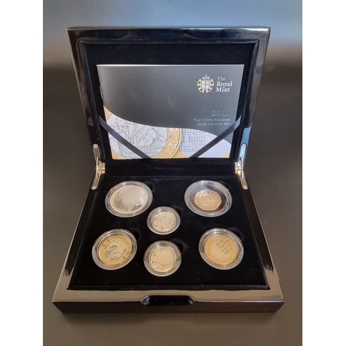 26 - Coins: a 2011 Royal Mint 'UK Silver Piedfort Set', containing six coins 50p to £5, with CoA, boxed.... 