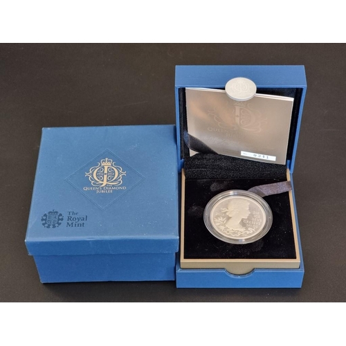 34 - Coins: a 2012 Royal Mint 'The Queen's Diamond Jubilee' silver proof Piedfort £5 coin, with CoA No.34... 