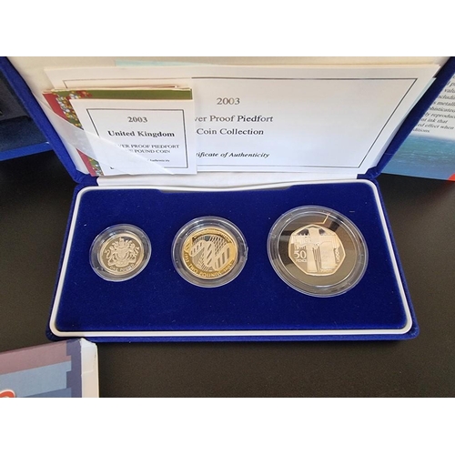 38 - Coins: a 2003 Royal Mint silver proof 'Piedfort  Three Coin Collection', containing 50p to £2, with ... 