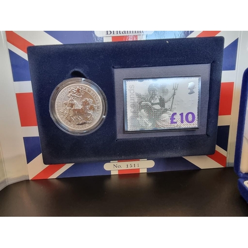 38 - Coins: a 2003 Royal Mint silver proof 'Piedfort  Three Coin Collection', containing 50p to £2, with ... 
