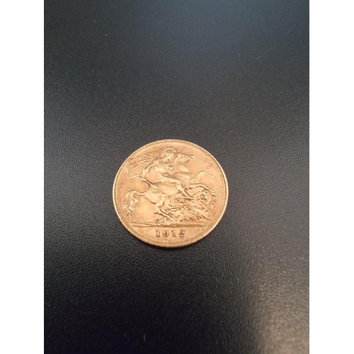 4 - Coins: a George V 1912 gold half sovereign.