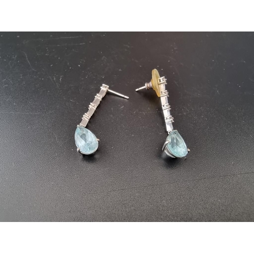 455A - A pair of 18ct white gold aquamarine & diamond pendant earrings, each set single pear shaped aqu... 