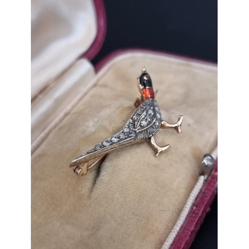 458 - A yellow and white metal diamond and enamel pheasant bar brooch, stamped 585, 29mm, cased.... 